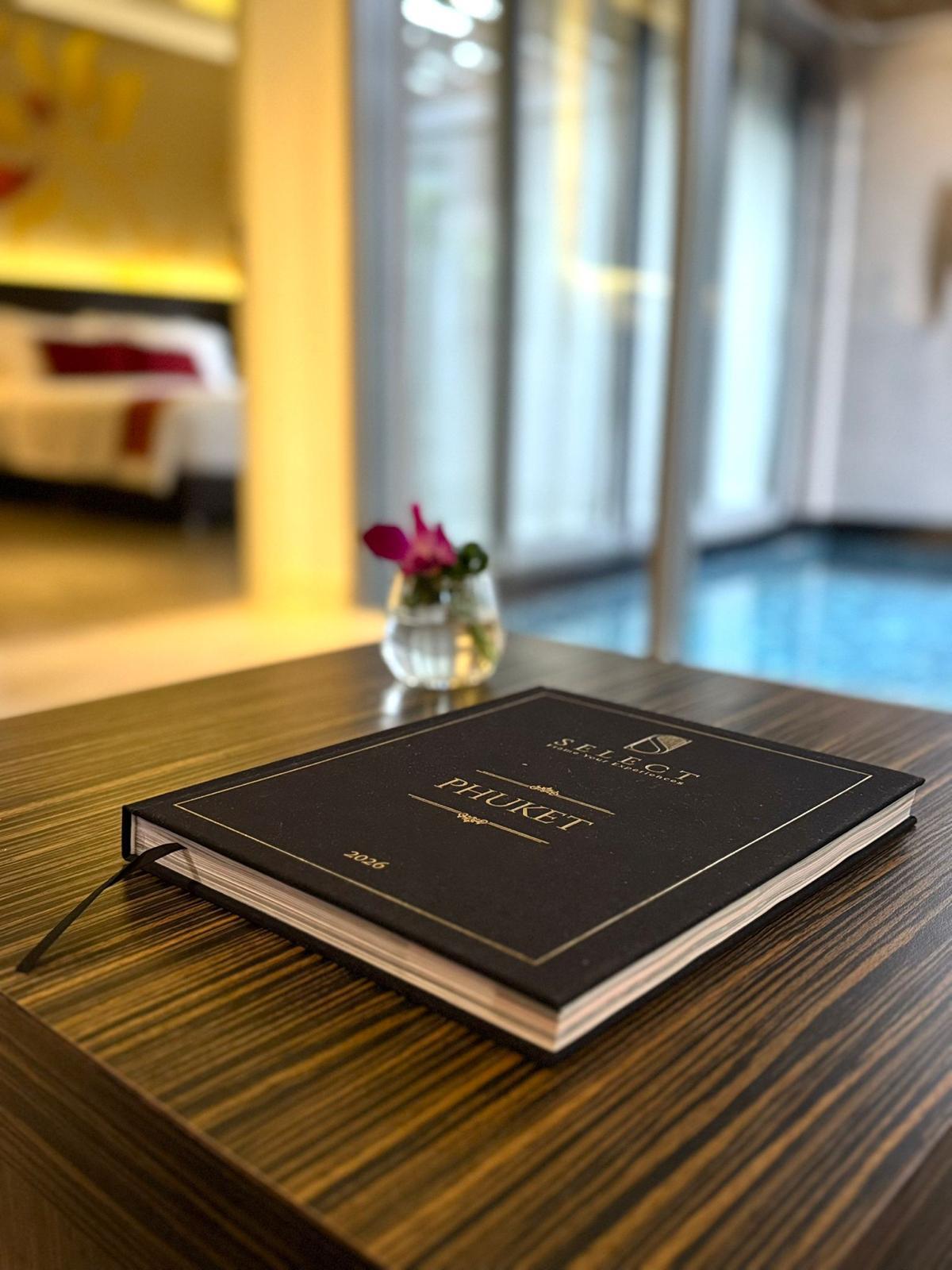 SELECT guide on hotel coffee table
